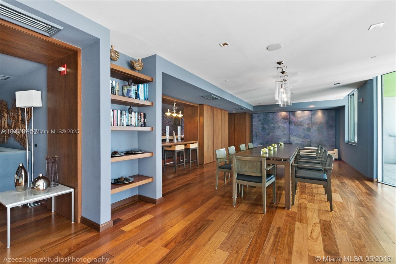 335 South Biscayne Boulevard, Unit 3410 Miami, FL 33131 - Photo 51 of 51 a dining room with furniture and wooden floor