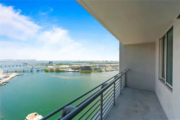 a view of a lake from a balcony