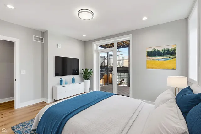 a view of a balcony with wooden floor
