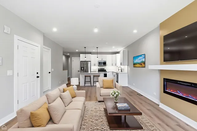 a kitchen with granite countertop a stove and a sink