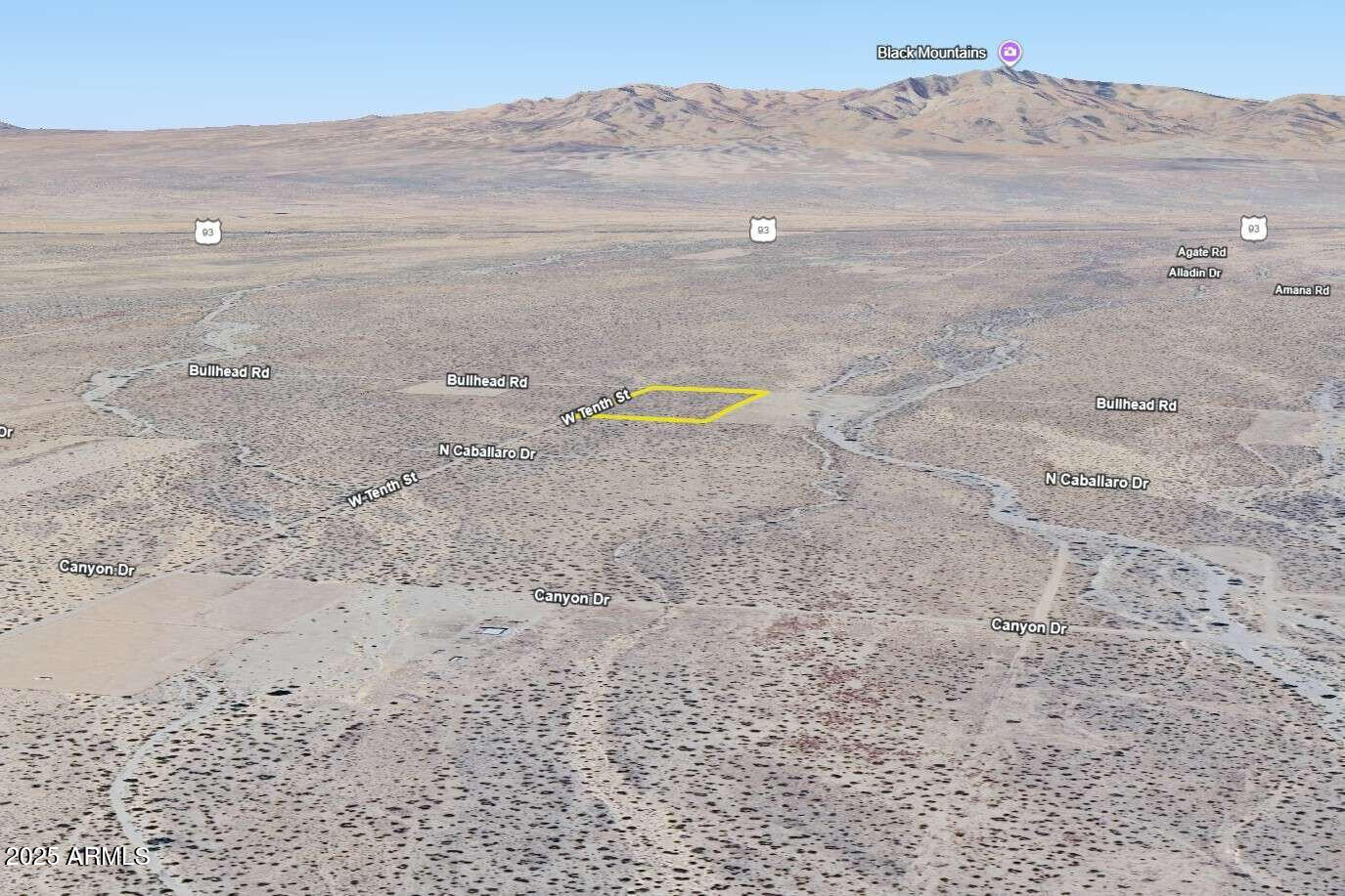 0 North Bullhead Road, Unit 57 Dolan Springs, AZ 86441 - Photo 34 of 36 a view of a dry yard with wooden floor