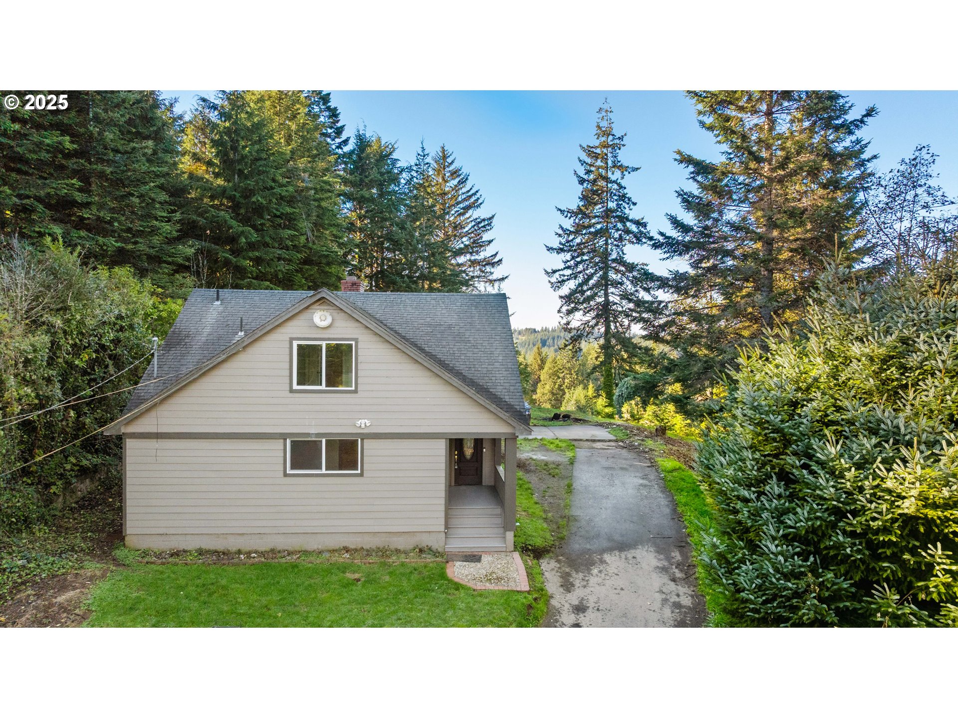 62356 Olive Barber Road Coos Bay, OR 97420 - Photo 33 of 34 a picture of a house with a yard