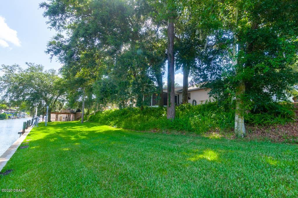 137 Hibiscus Road Edgewater, FL 32141 - Photo 30 of 38 Beautiful Lawn