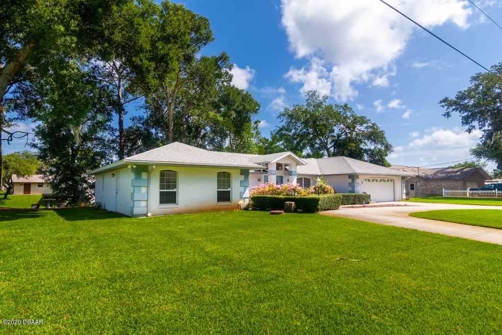 137 Hibiscus Road Edgewater, FL 32141 - Photo 5 of 38 Nice Lawn