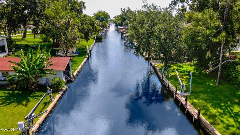 137 Hibiscus Road Edgewater, FL 32141 - Photo 6 of 38 150' of Canalfrontage