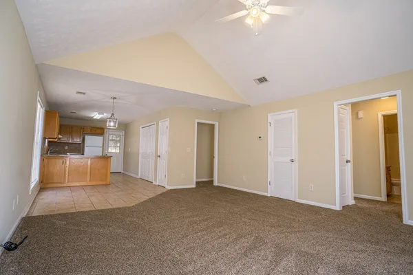 a view of a livingroom with a staircase