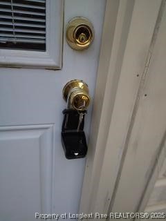 12121 Cameron Way Maxton, NC 28364 - Photo 13 of 29 a close view of door lock