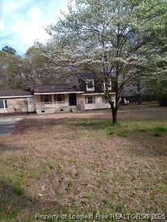 12121 Cameron Way Maxton, NC 28364 - Photo 27 of 29 a view of a house with a yard
