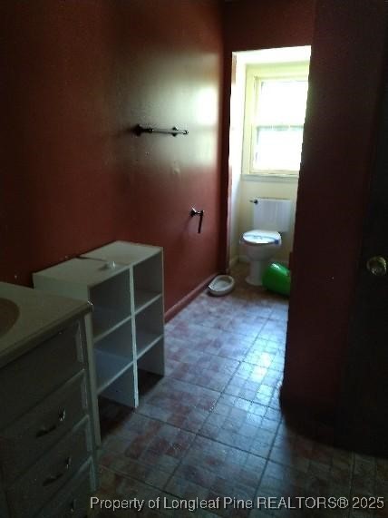 12121 Cameron Way Maxton, NC 28364 - Photo 28 of 29 a bathroom with a toilet