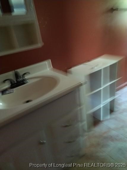 12121 Cameron Way Maxton, NC 28364 - Photo 29 of 29 a bathroom with a bathtub