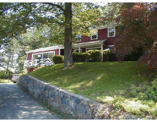 9 Tricorne Road Lexington, MA 02421 - Photo 1 of 1 a view of a house with a yard