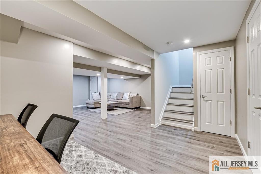 3003 Hana Road Edison, NJ 08817 - Photo 33 of 45 a view of a bedroom with furniture and wooden floor