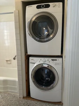 a utility room with dryer and washer