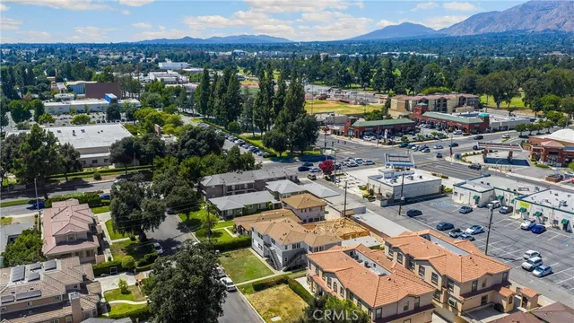 an aerial view of a houses and city view
