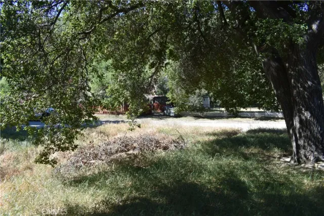 a view of lake with green space