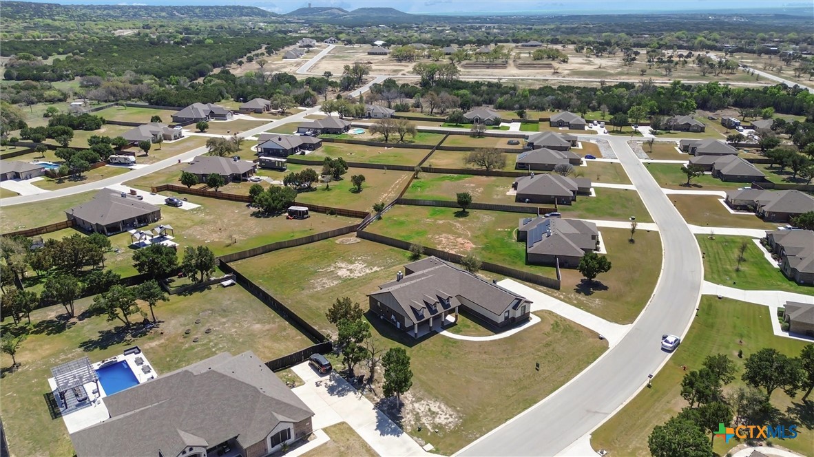 3919 Gracey Lane Kempner, TX 76539 - Photo 4 of 44 an aerial view of a house with a swimming pool