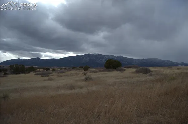 a view of an outdoor space and mountain view