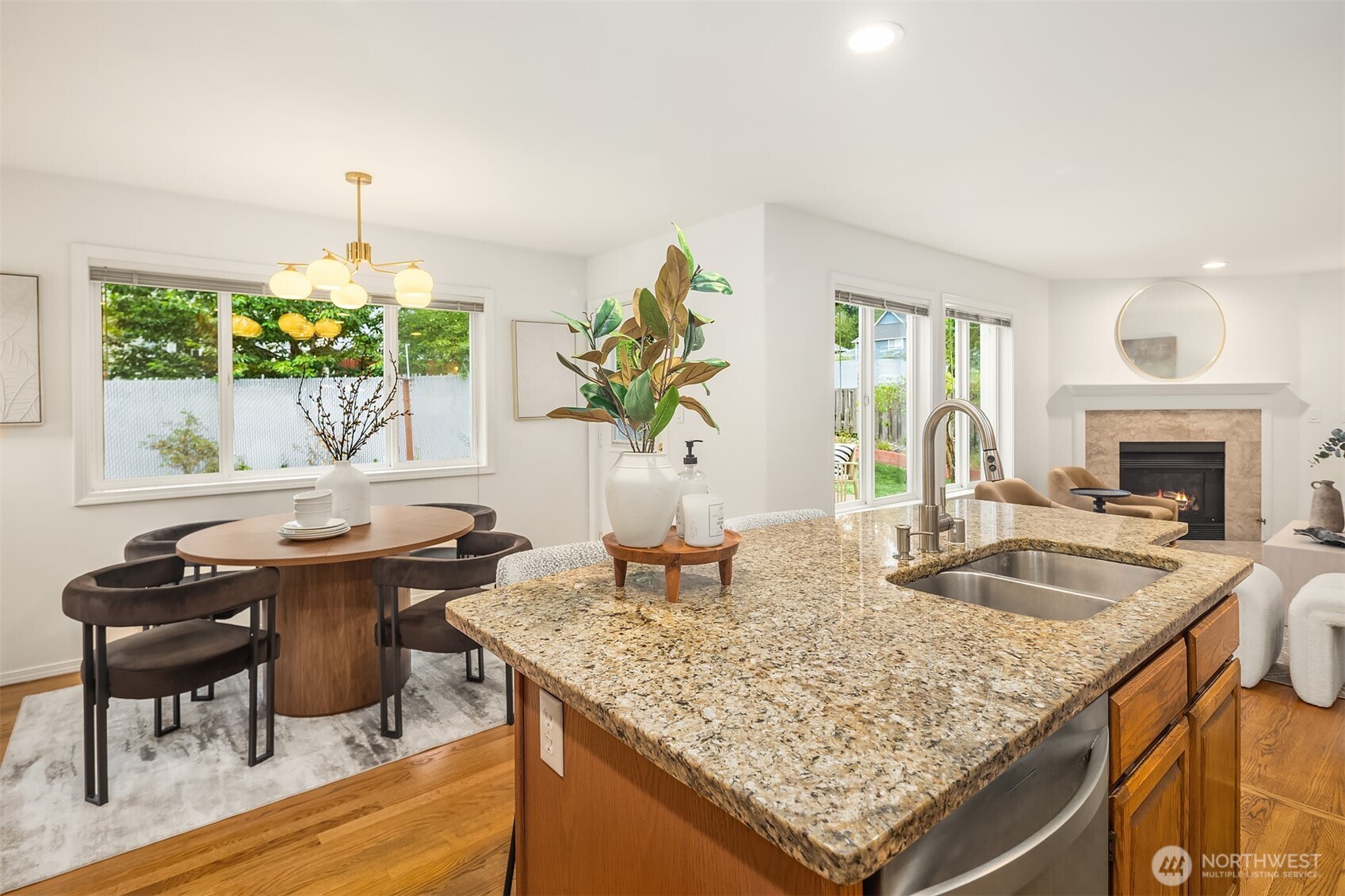1417 232nd Place Southwest Bothell, WA 98021 - Photo 15 of 40 a kitchen with a sink and a granite counter tops