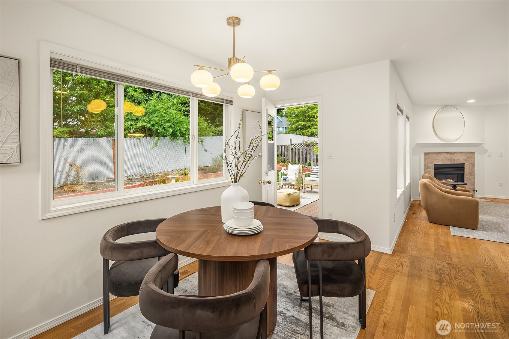 1417 232nd Place Southwest Bothell, WA 98021 - Photo 16 of 40 a dining room with furniture a chandelier and wooden floor