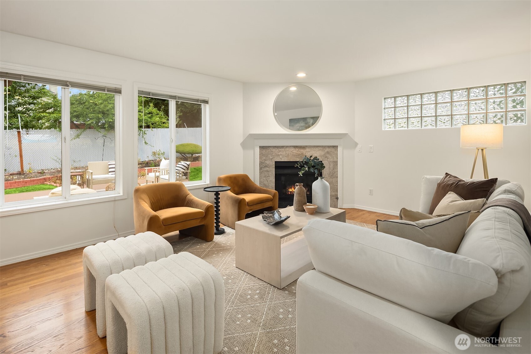 1417 232nd Place Southwest Bothell, WA 98021 - Photo 18 of 40 a living room with furniture and a fireplace