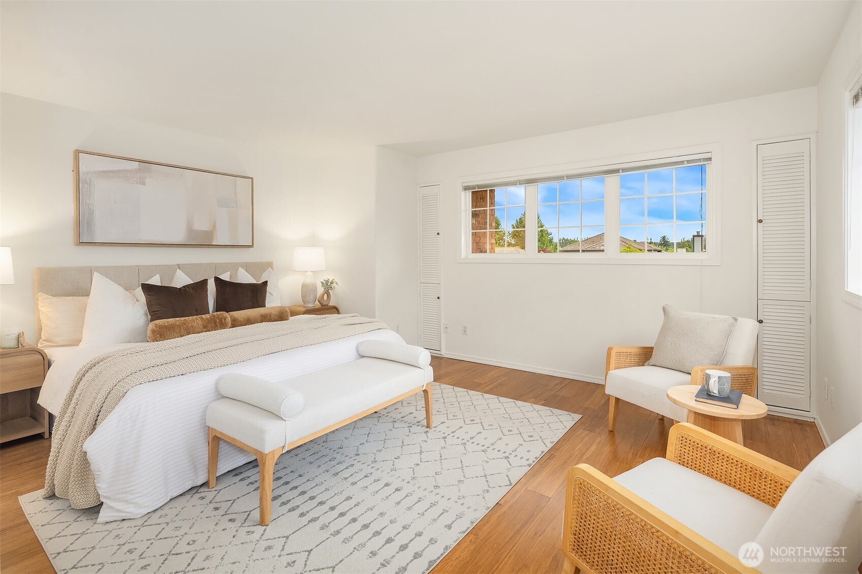 1417 232nd Place Southwest Bothell, WA 98021 - Photo 22 of 40 a bedroom with a bed and wooden floor