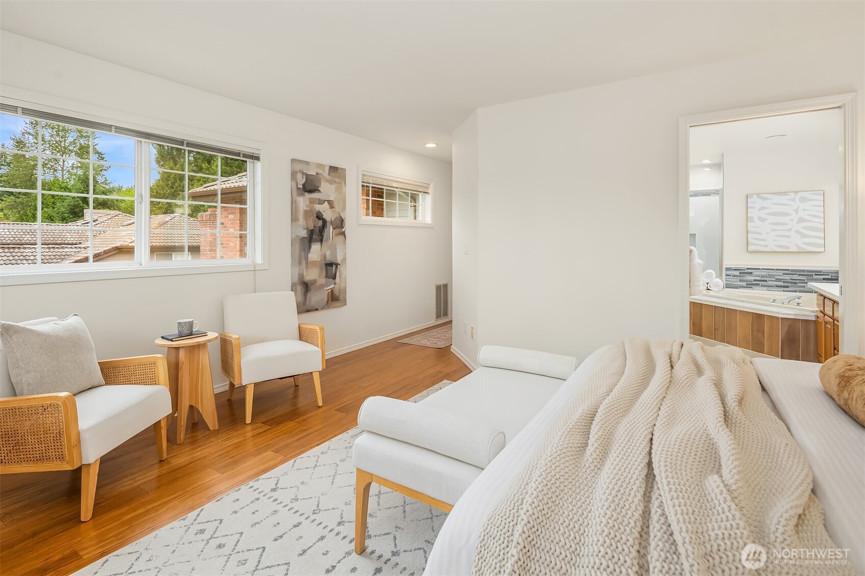 1417 232nd Place Southwest Bothell, WA 98021 - Photo 23 of 40 a bedroom with a bed and wooden floor