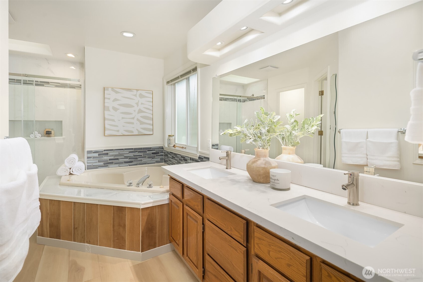 1417 232nd Place Southwest Bothell, WA 98021 - Photo 24 of 40 a bathroom with a tub sink and mirror
