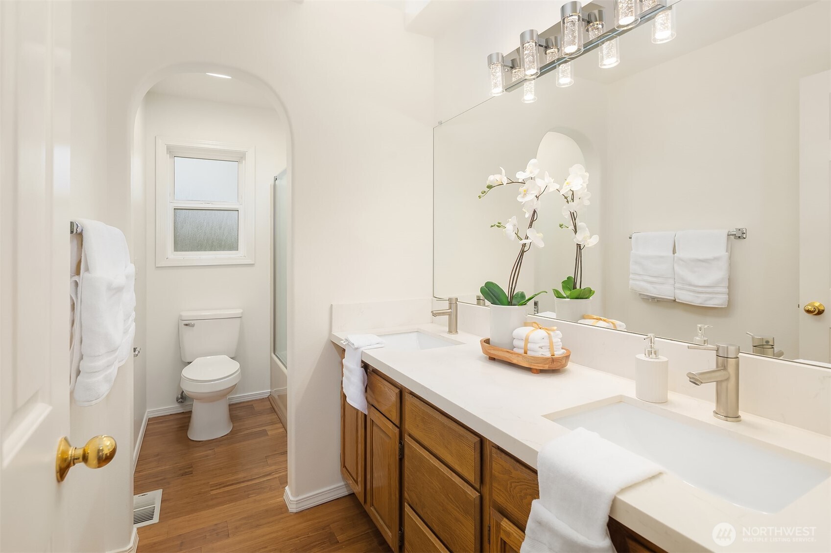 1417 232nd Place Southwest Bothell, WA 98021 - Photo 29 of 40 a bathroom with a sink a toilet and a mirror