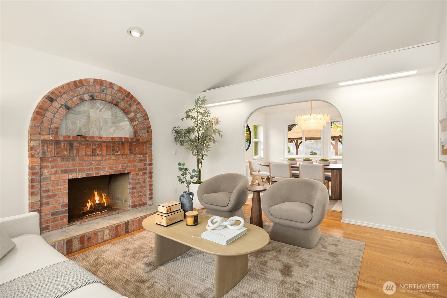 1417 232nd Place Southwest Bothell, WA 98021 - Photo 8 of 40 a living room with furniture and a fireplace
