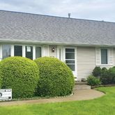 a view of a house with a garden