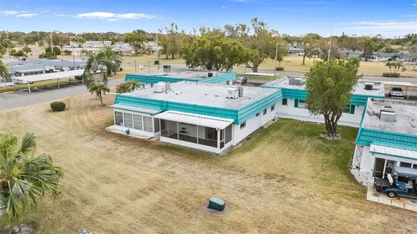 a view of a swimming pool with a terrace