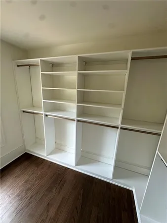 a view of an empty walk in closet