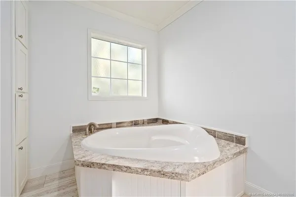 a bathroom with a bathtub