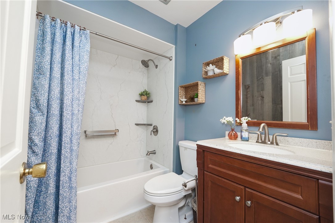 2674 Smith Road Fairlawn, OH 44333 - Photo 20 of 31 Full bath featuring toilet, shower / tub combo, and vanity