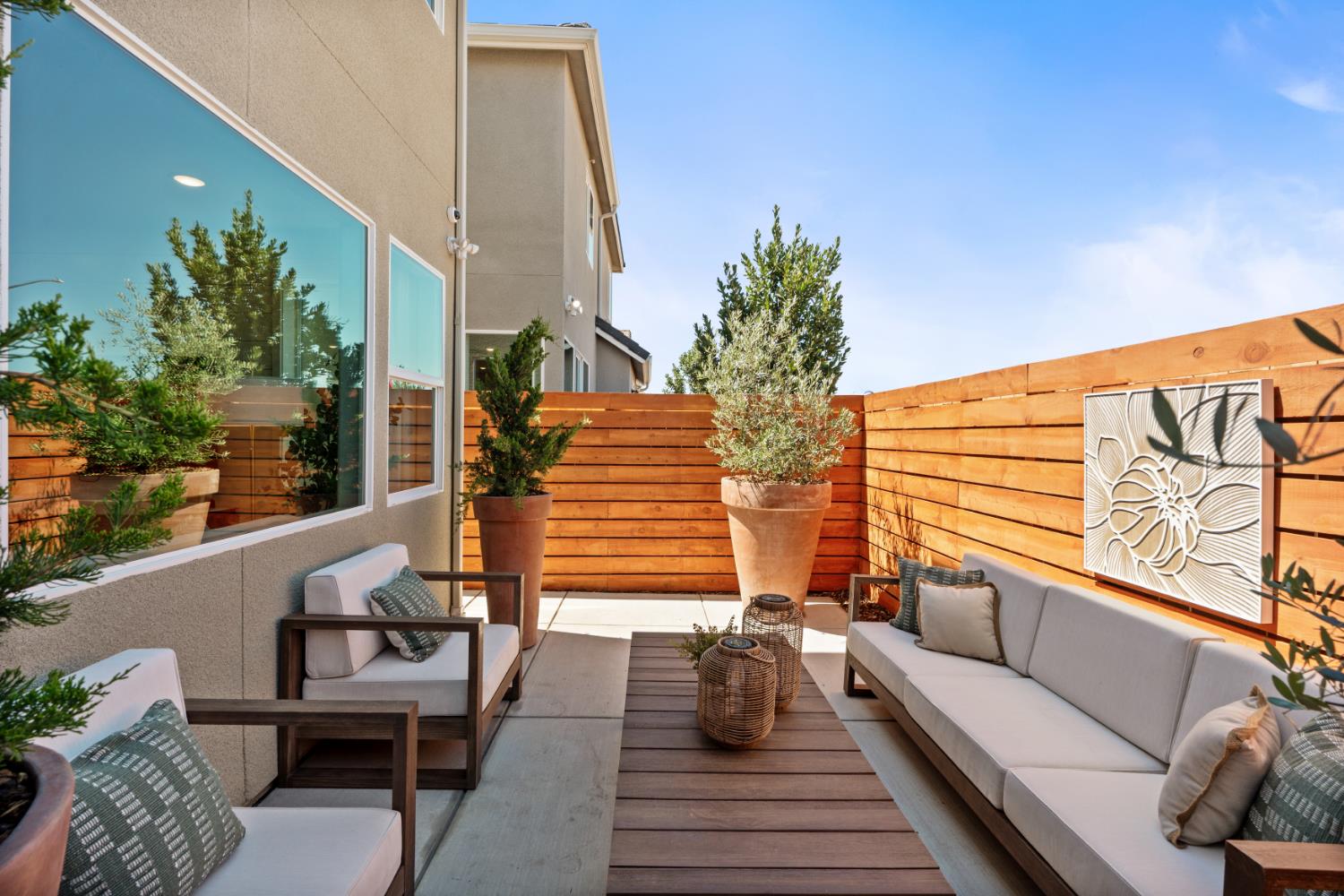1490 Redbrick Lane Clovis, CA 93619 - Photo 31 of 34 a balcony with furniture and wooden floor