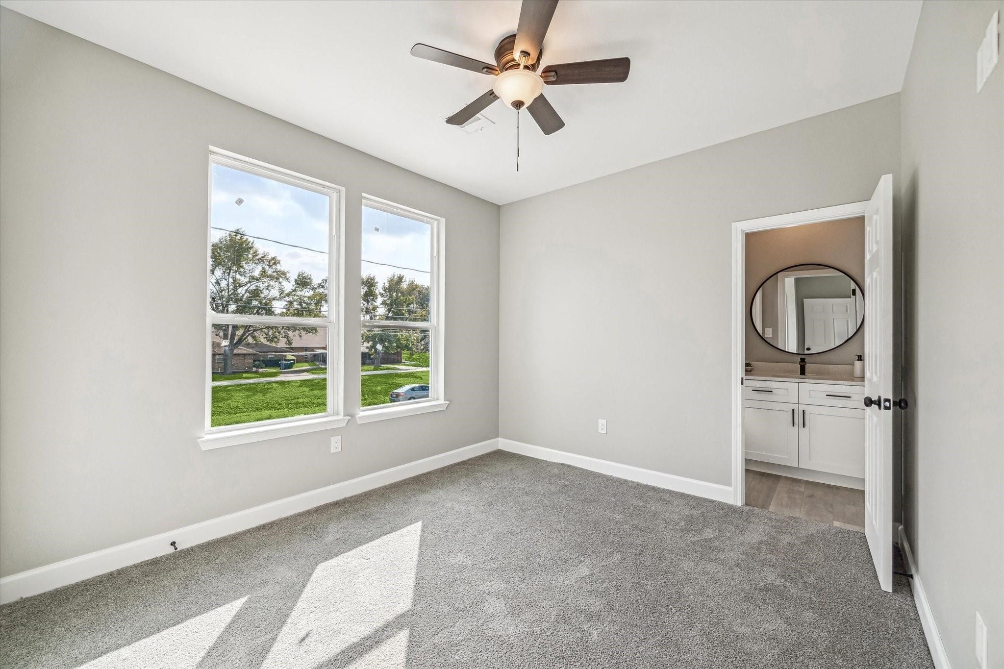 982 Randolph Street Houston, TX 77088 - Photo 12 of 12 Nice size secondary Bedrooms w/ Jack&Jill Bathroom