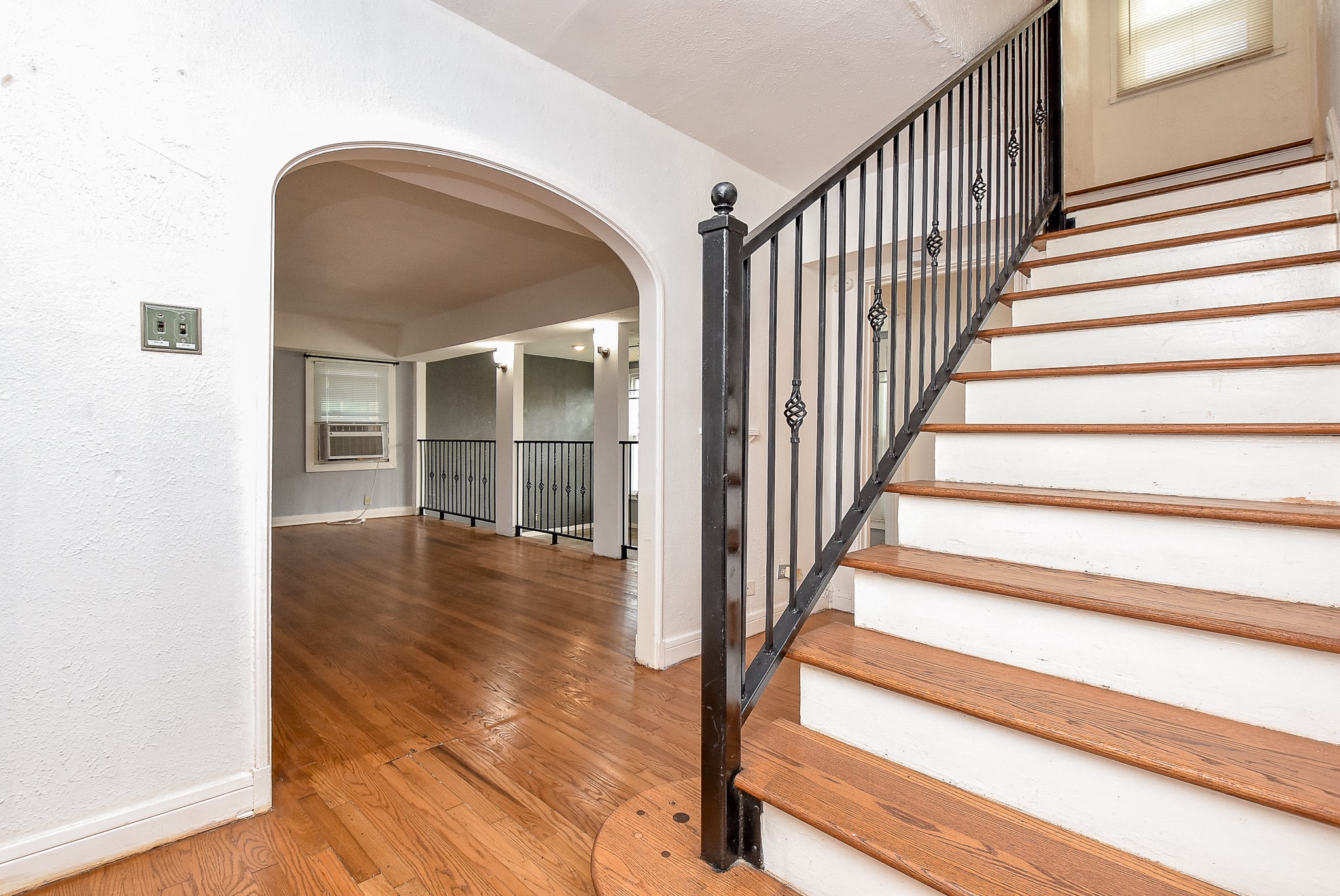 4916 Old Spanish Trail Houston, TX 77021 - Photo 5 of 32 a view of front door with wooden floor and stairs