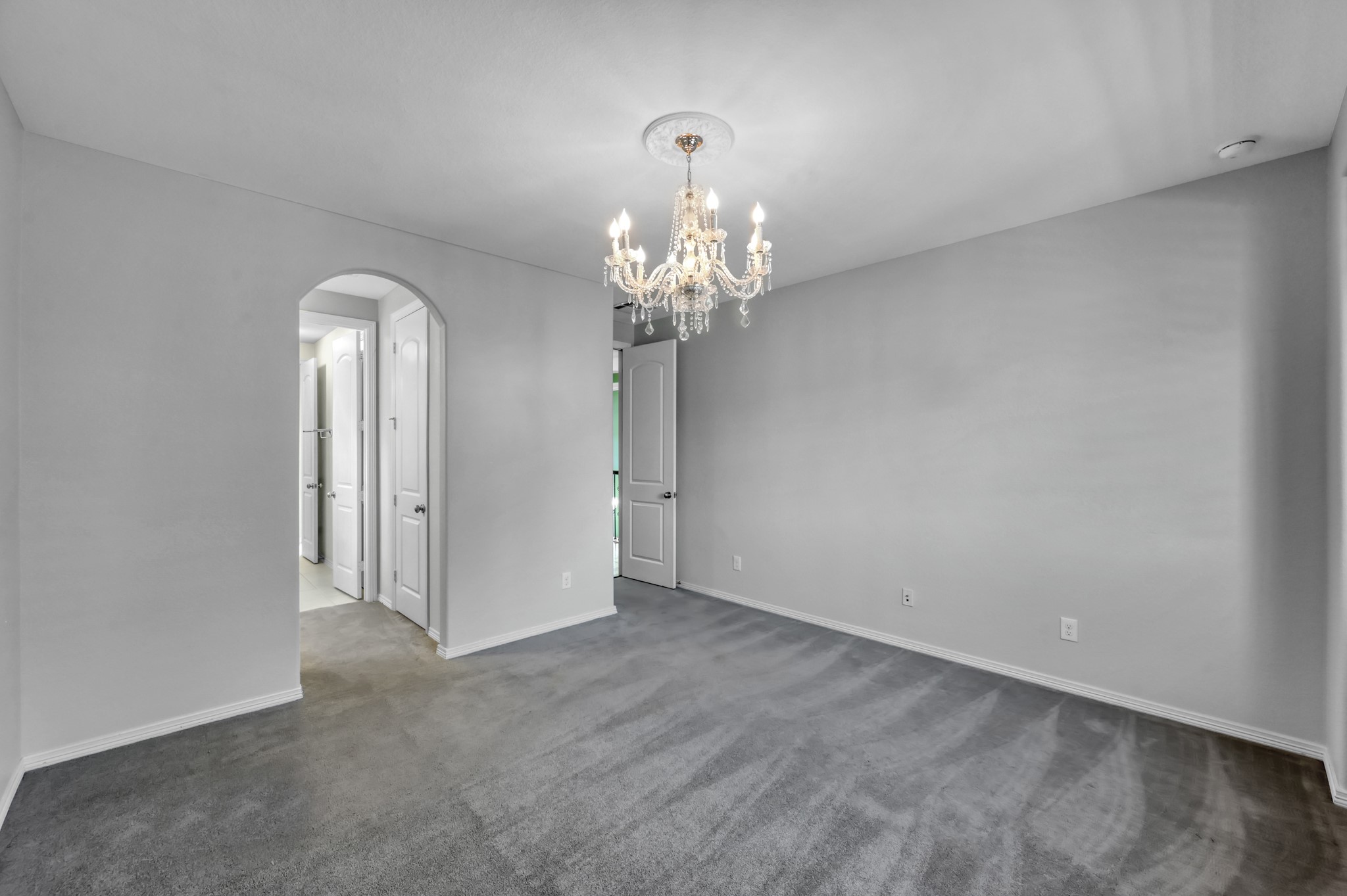 23219 Belted Kingfisher Trail Spring, TX 77389 - Photo 31 of 43 a view of a chandelier in big room and chandelier
