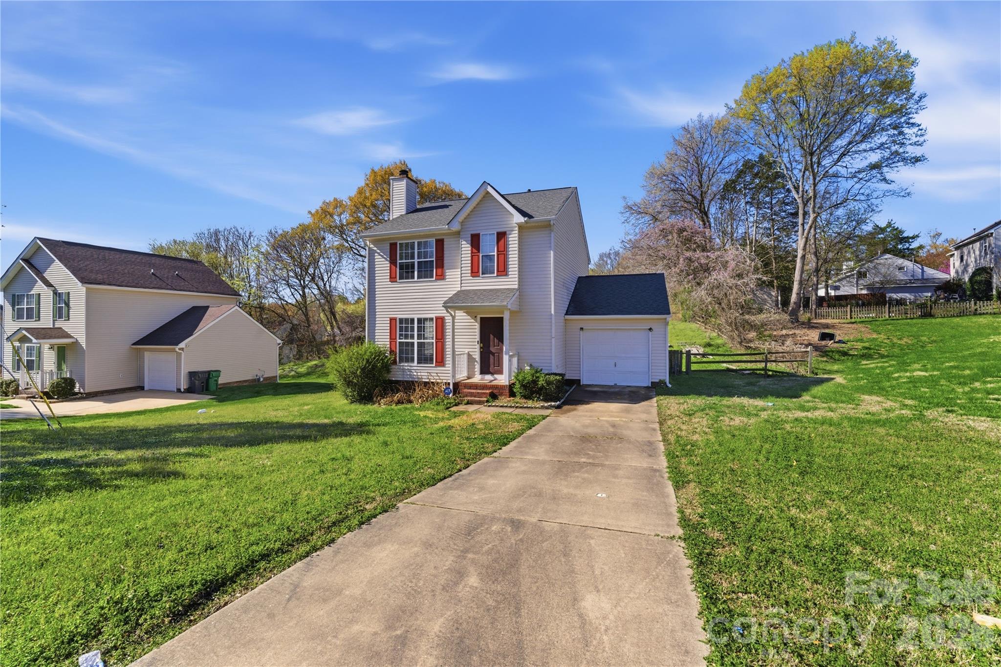 8608 Moody Road Charlotte, NC 28215 - Photo 2 of 33 a front view of house with yard and green space
