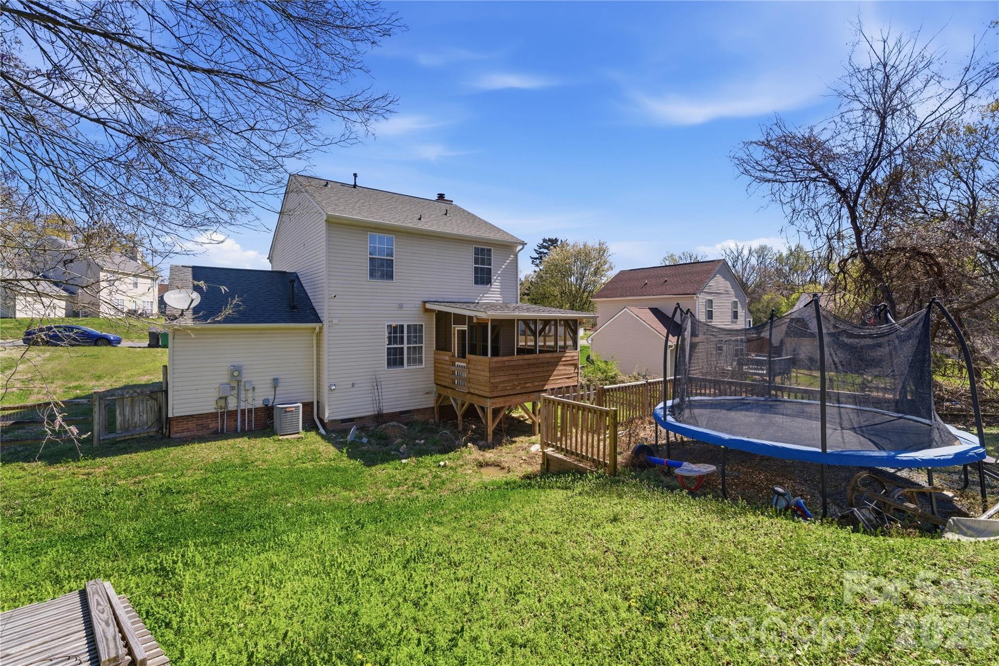8608 Moody Road Charlotte, NC 28215 - Photo 30 of 33 a front view of house with yard and seating area