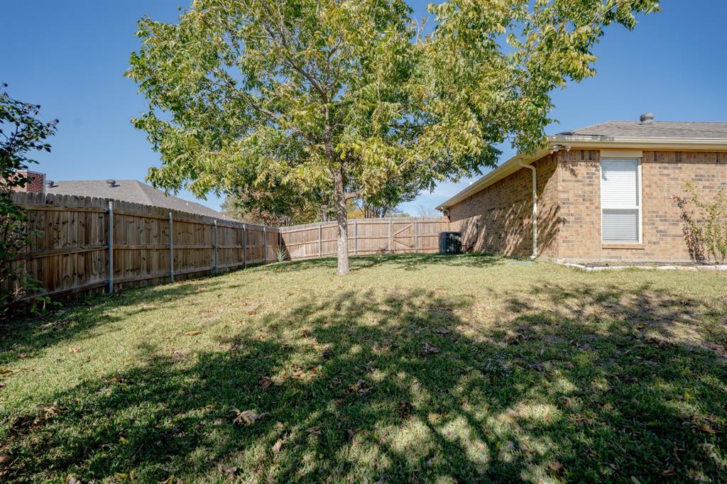 7205 Windcrest Court East North Richland Hills, TX 76182 - Photo 24 of 35 a view of backyard with green space