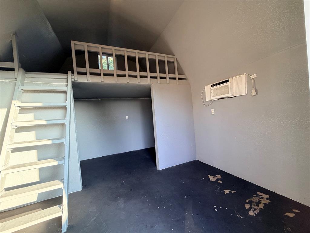 7205 Windcrest Court East North Richland Hills, TX 76182 - Photo 29 of 35 a view of an empty room with a window