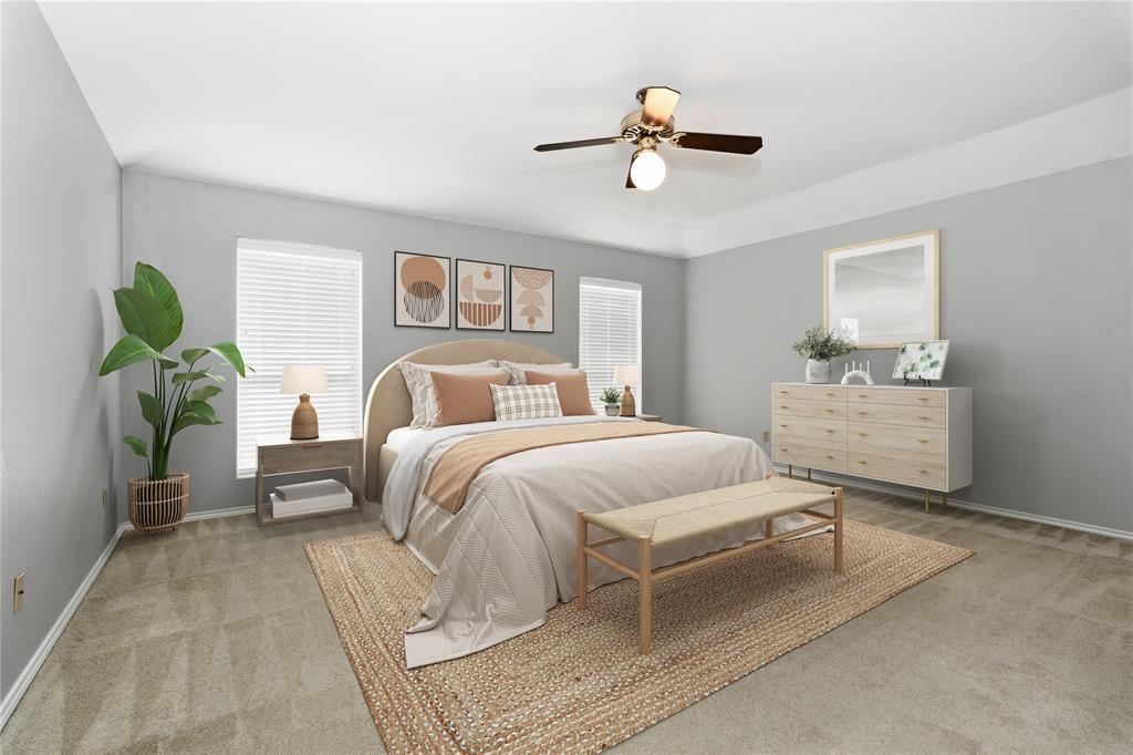 7205 Windcrest Court East North Richland Hills, TX 76182 - Photo 7 of 35 a bedroom with a bed and ceiling fan