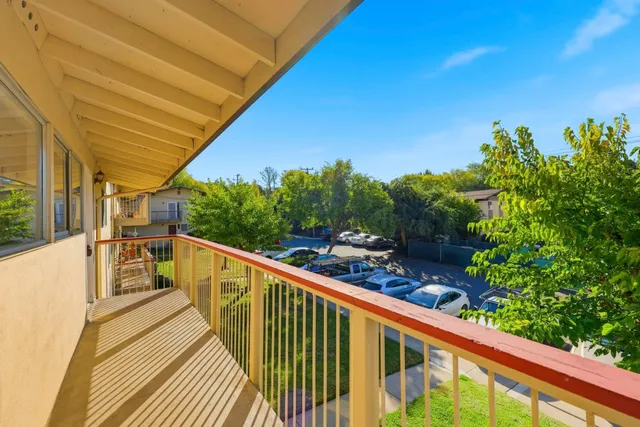 a balcony with an outdoor space