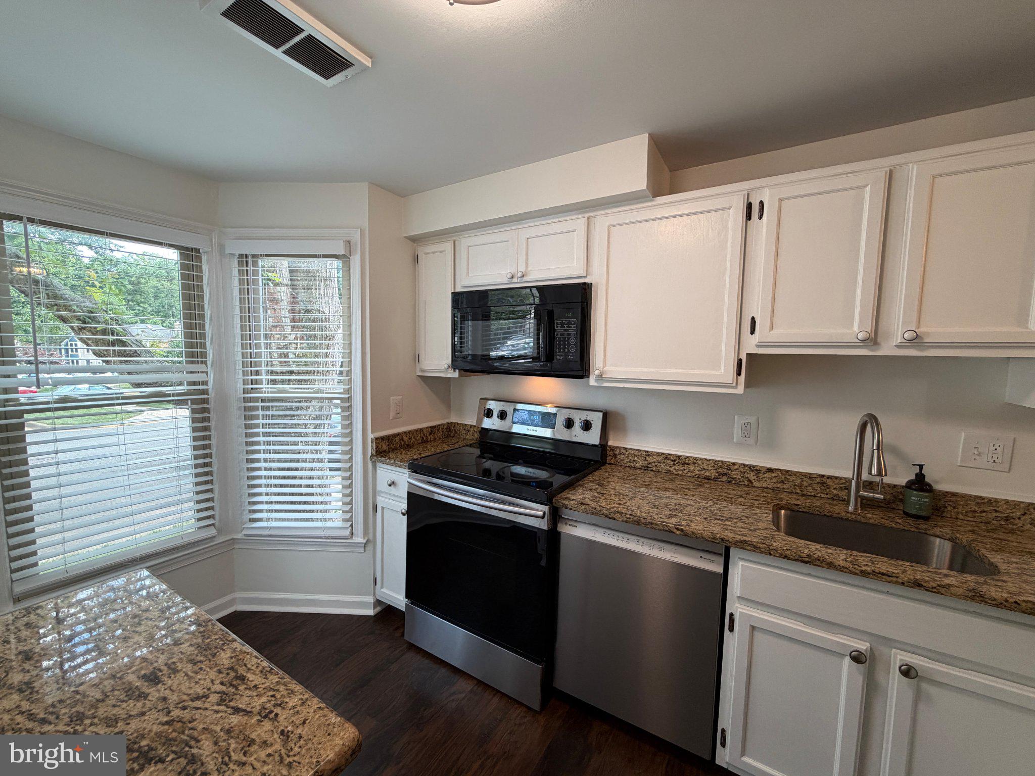 2121 Whisper Way Reston, VA 20191 - Photo 3 of 61 Bright and modern kitchen oasis.