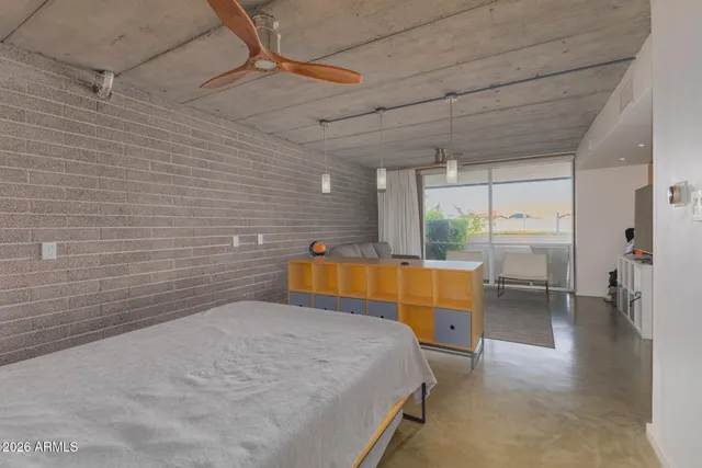a view of a hallway with washer and dryer