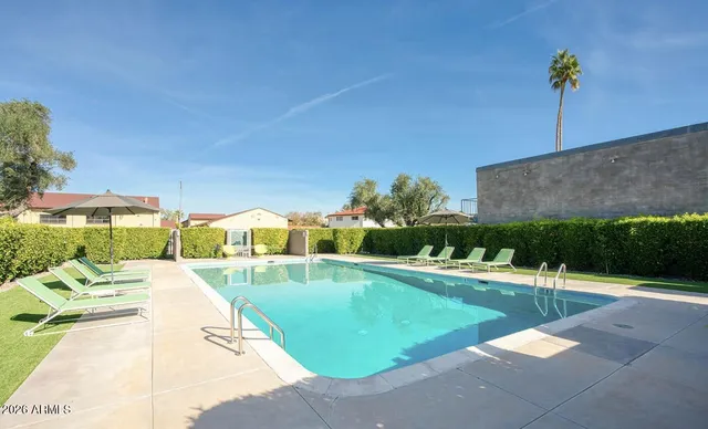 a view of living room with a sink and chandelier