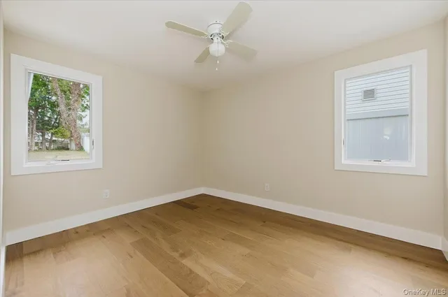 a view of a room that has a window in it