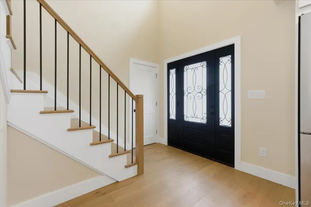 a view of an entryway with staircase