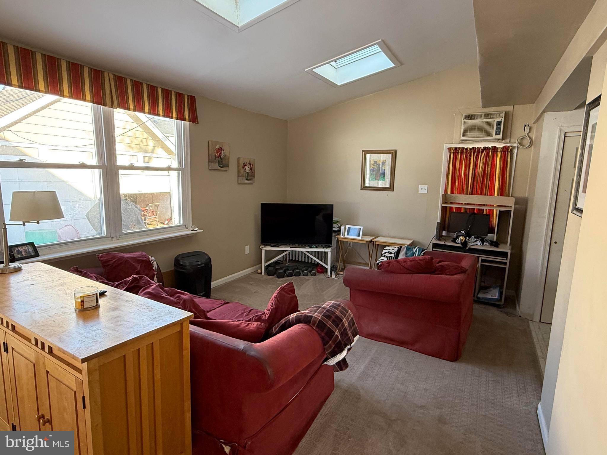 530 Kenmore Road Havertown, PA 19083 - Photo 11 of 25 a living room with furniture a flat screen tv and a window
